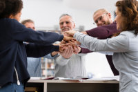 Empresarios Motivandose en equipo
